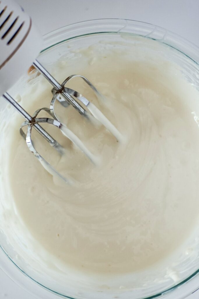 beat together the eggs, softened cream cheese, granulated sugar, and vanilla extract.