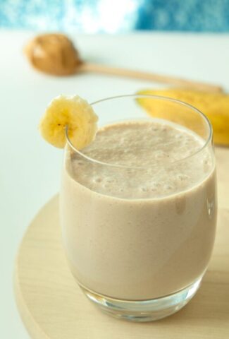 banana peanut butter smoothie close up.